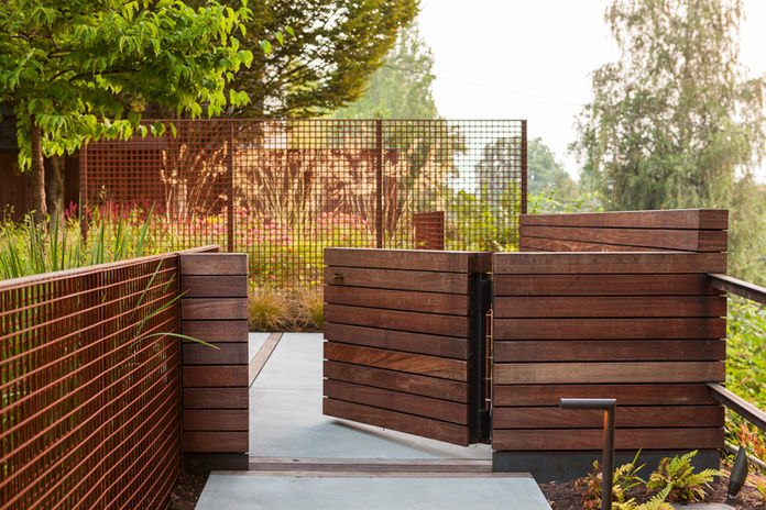 Timber fence and built-in garden seating
