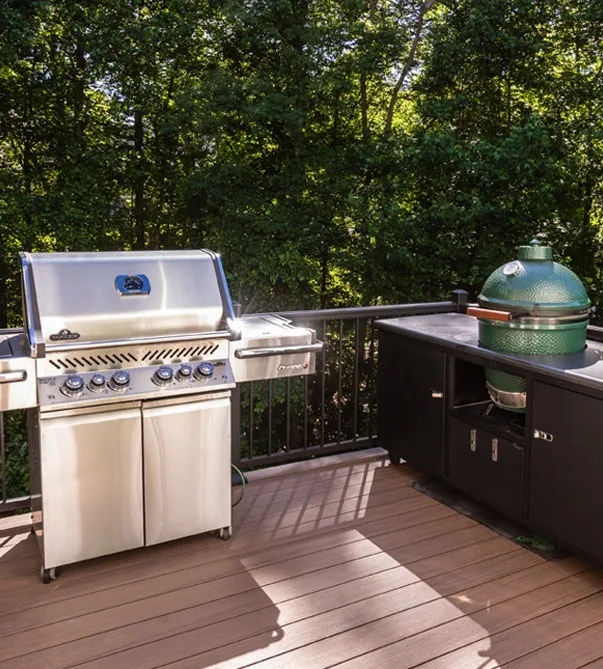 Grill and ceramic cooker on the deck.