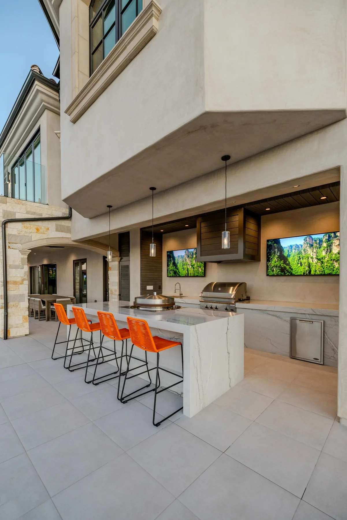 Long outdoor kitchen counter beside the house.