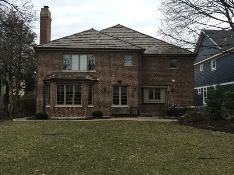 The lawn and small patio before the Elmhurst renovation.