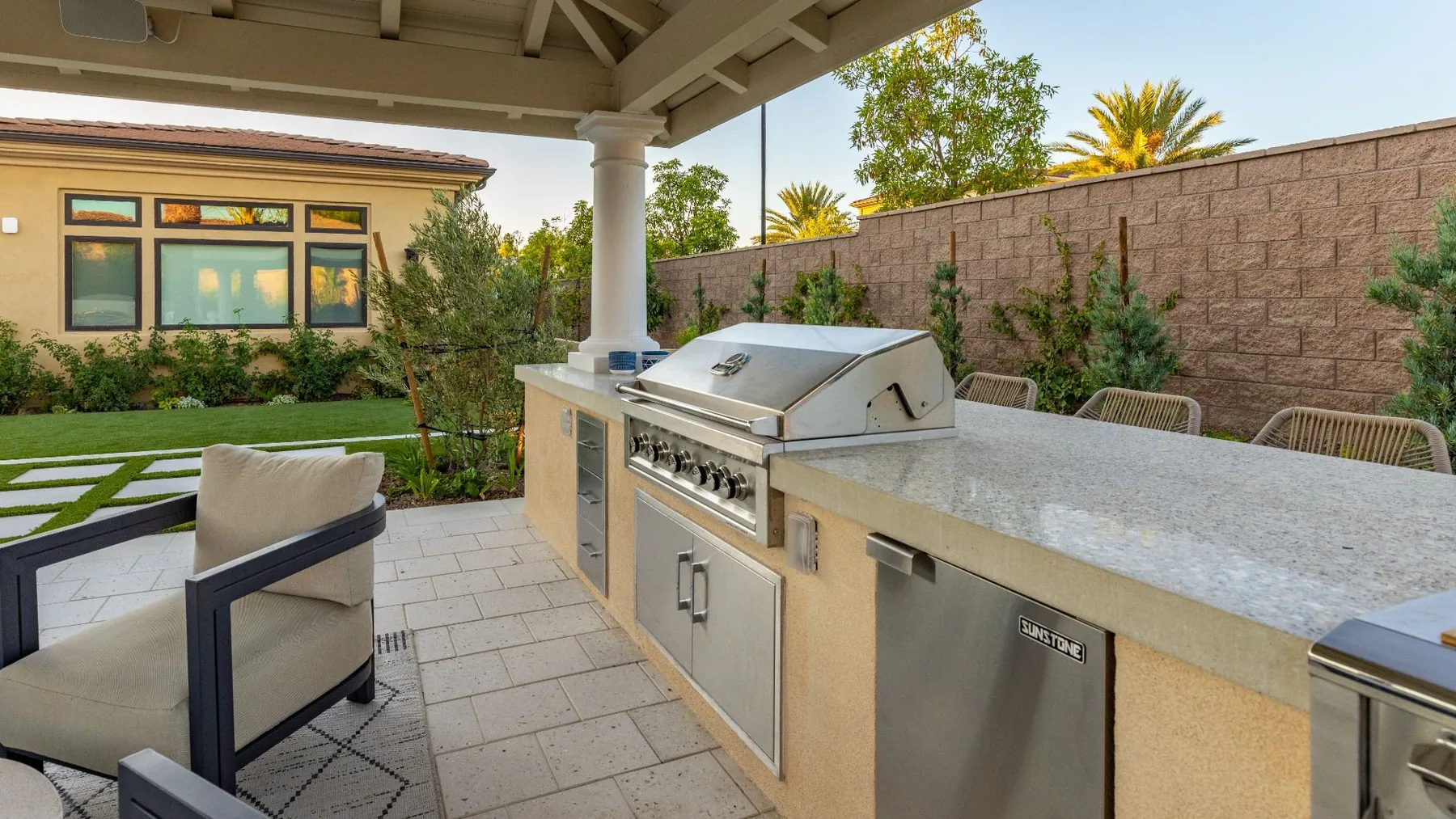 Grill and counter in the outdoor kitchen.