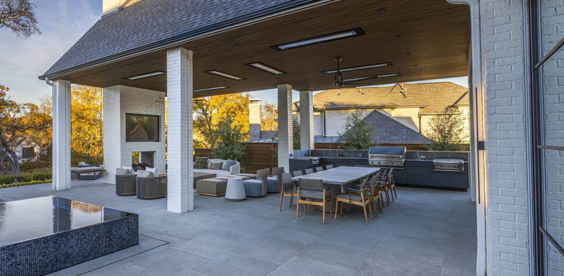 Covered outdoor dining and lounge area.