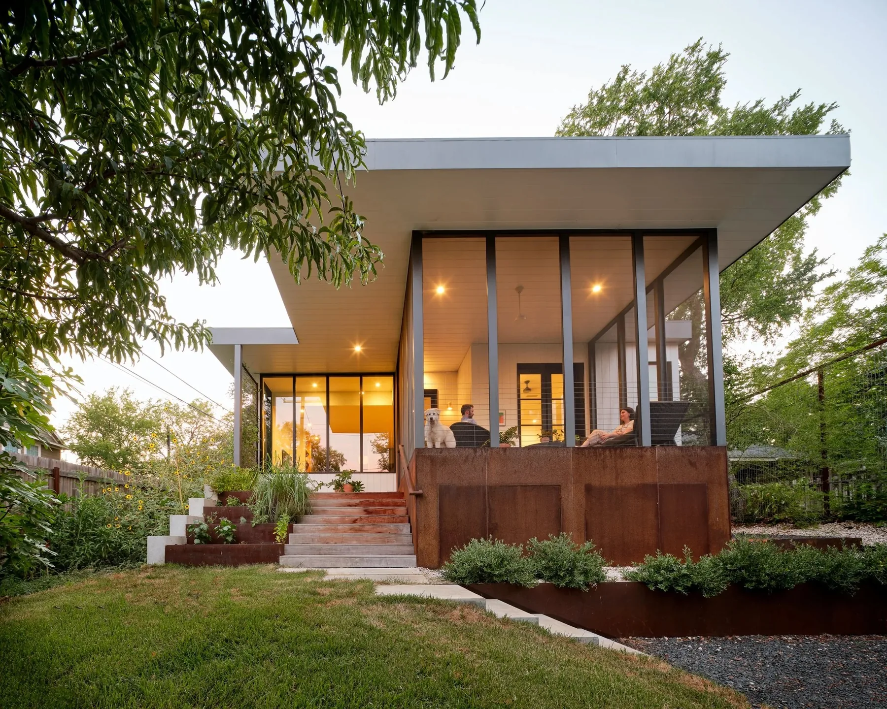 Rear garden beside a contemporary addition.